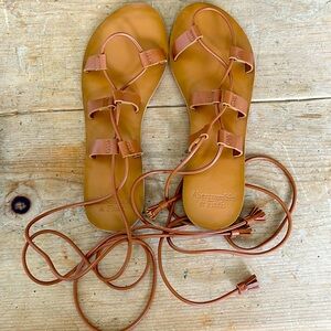 Abercrombie & Fitch sandals with tassels.
